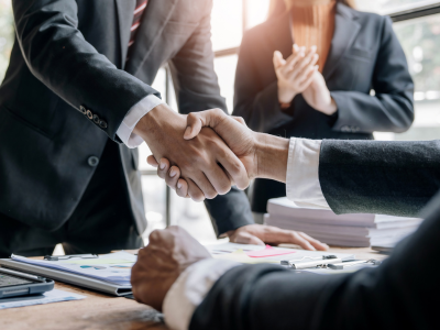 Illustration showing Wolters Kluwer acquiring Libra Technology to expand AI-powered legal research and document analysis tools.